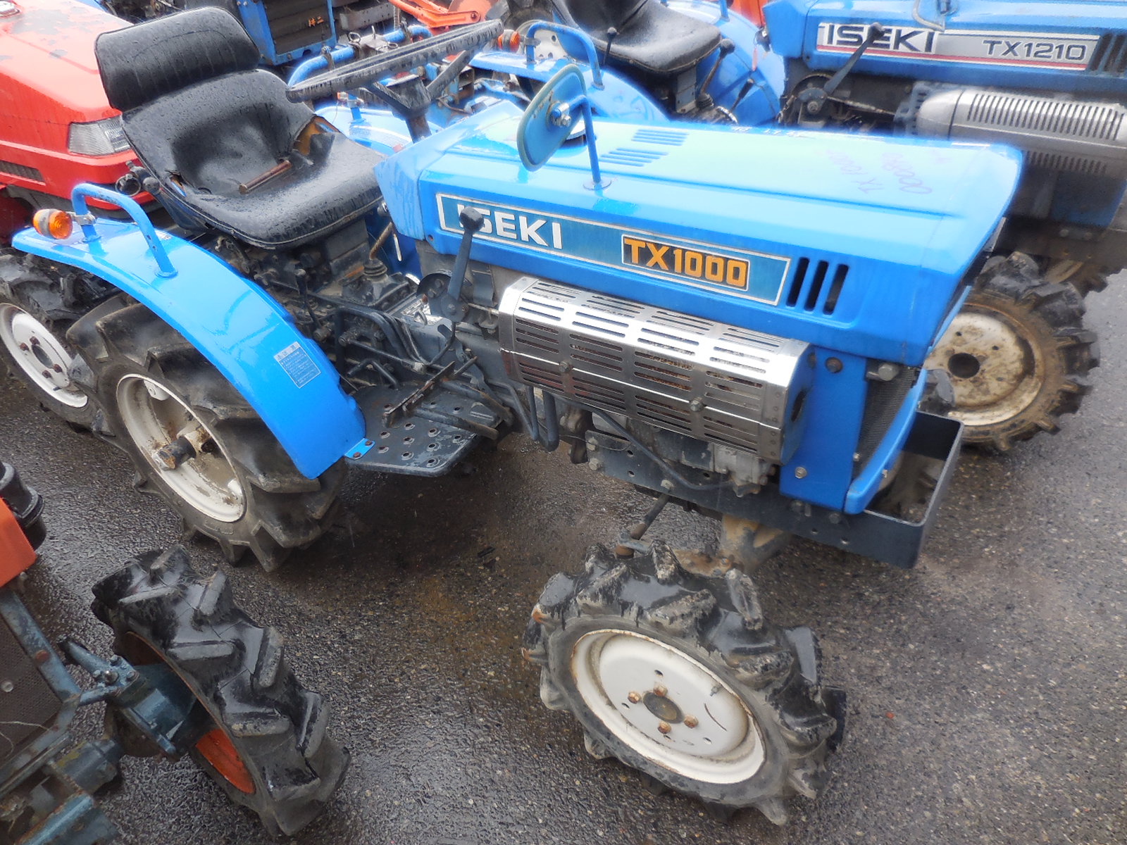 Tractor Japonez ISEKI TX1000 10HP 4WD - EdoLike - Pret | Preturi Tractor Japonez ISEKI TX1000 10HP 4WD - EdoLike