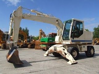 Excavator Case 2000 pe roti 76kW 15t de vanzare second hand - Pret | Preturi Excavator Case 2000 pe roti 76kW 15t de vanzare second hand