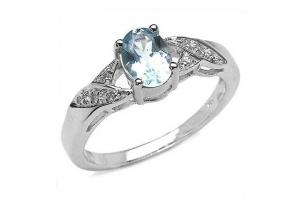 Inel de logodna cu diamante si topaz albastru - Pret | Preturi Inel de logodna cu diamante si topaz albastru