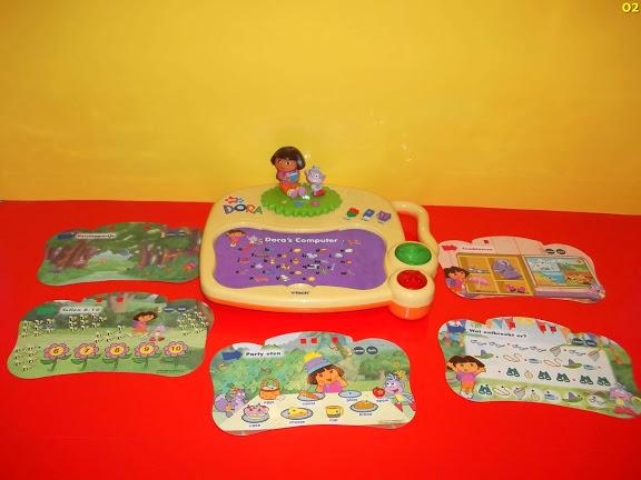 jucarii leptop dora cu mai multe functii si activitati si jocuri de la vtech muzical - Pret | Preturi jucarii leptop dora cu mai multe functii si activitati si jocuri de la vtech muzical