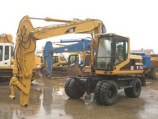 Excavator mobil Caterpillar M315 de vanzare second hand import vanzari excavatoare pe pneuri excavatoare mobile second h - Pret | Preturi Excavator mobil Caterpillar M315 de vanzare second hand import vanzari excavatoare pe pneuri excavatoare mobile second h