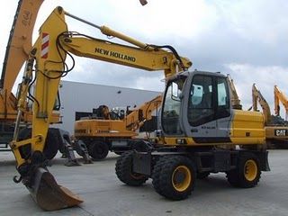 Excavator mobil New Holland MH PlusC de vanzare second hand stare buna import vanzari excavatoare pe roti sh - Pret | Preturi Excavator mobil New Holland MH PlusC de vanzare second hand stare buna import vanzari excavatoare pe roti sh