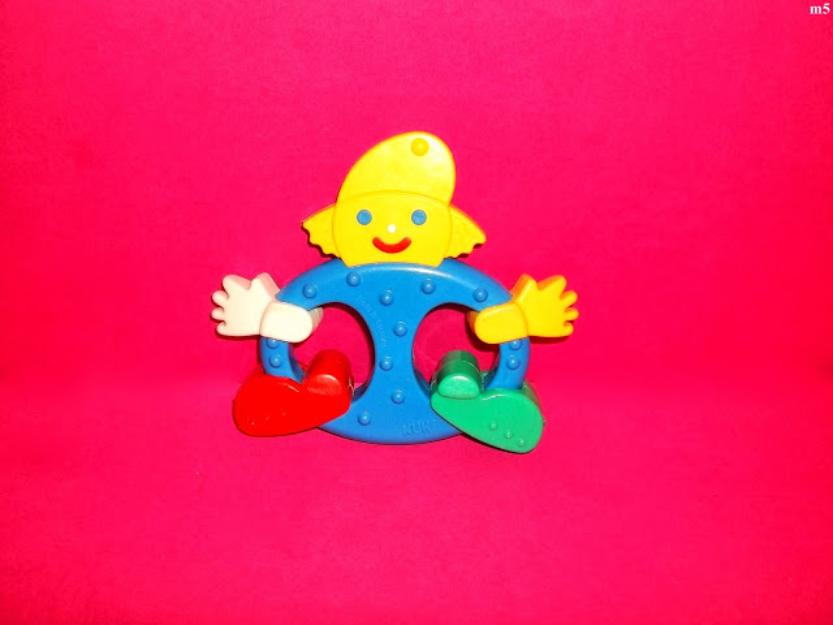 jucarii jucarie pentru bebelus figurina omulet zornaitor din plastic de la nuk - Pret | Preturi jucarii jucarie pentru bebelus figurina omulet zornaitor din plastic de la nuk