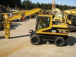 Excavator mobil Caterpillar M315 de vanzare second hand import vanzari excavatoare pe pneuri excavatoare mobile second h - Pret | Preturi Excavator mobil Caterpillar M315 de vanzare second hand import vanzari excavatoare pe pneuri excavatoare mobile second h