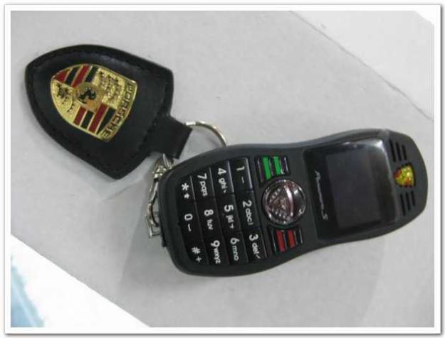 Telefoane Porsche breloc in forma de alarma auto - Pret | Preturi Telefoane Porsche breloc in forma de alarma auto